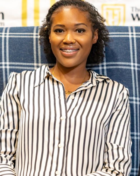 Briana Beatty, seated