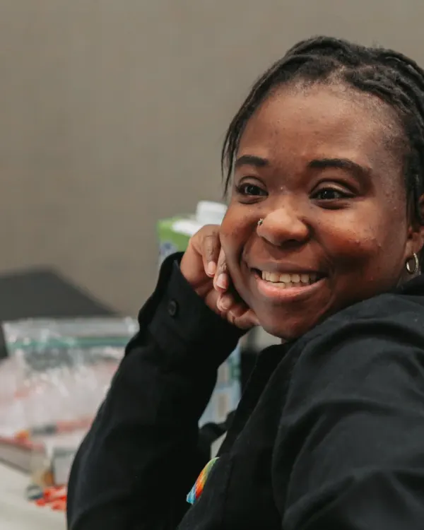 A TWF hospitality team member laughing