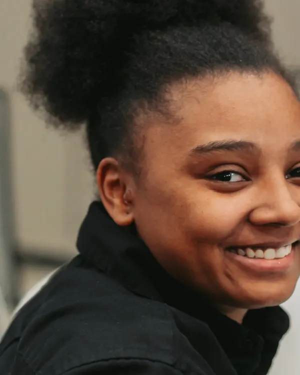 A TWF hospitality team member smiling